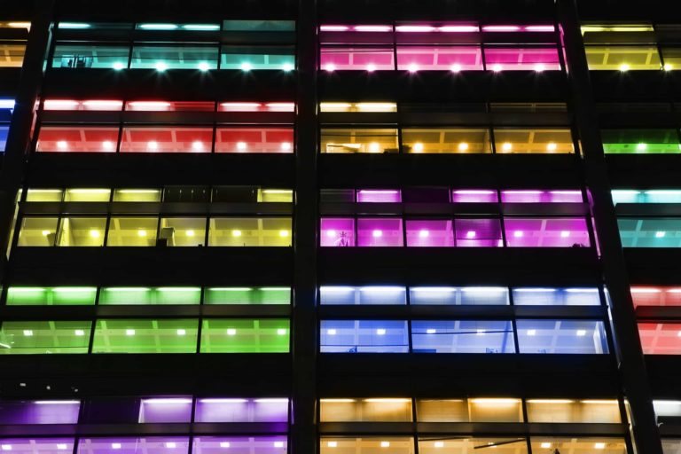 Building at night with multi-colored lights